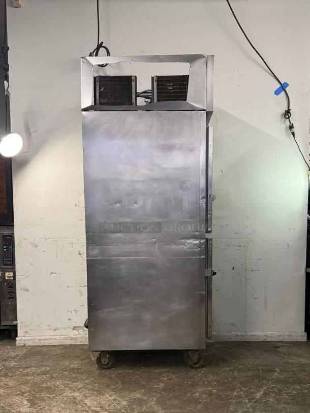 VICTORY Dual Temp Refrigerator/Freezer, Model RFS 1D S7 HD, stainless steel, industrial condition, on casters.