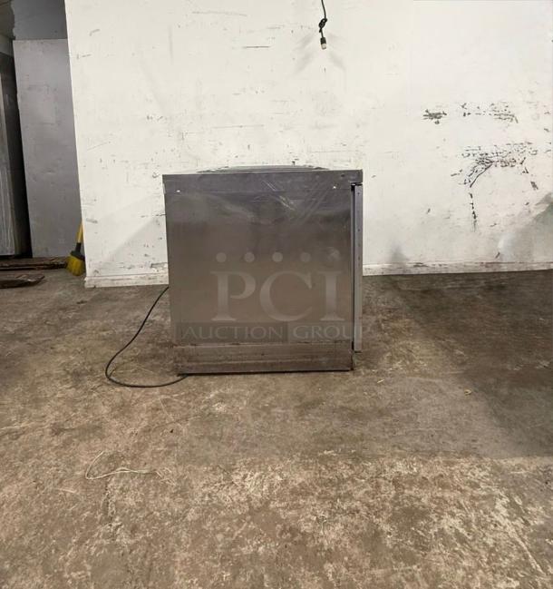 Delfield 4448NP-18M 48" refrigerated prep table, stainless steel, visible wear, electric cord attached.