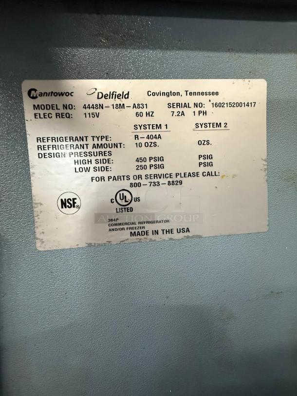 Delfield 4448NP-18M 48" 2-Door Refrigerated Sandwich Prep Table, model and specs label visible.