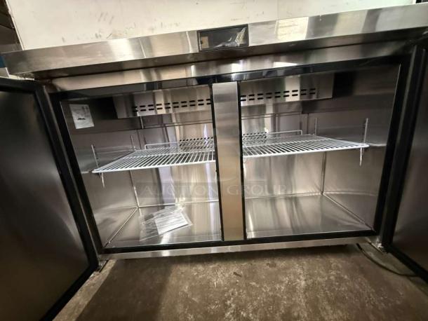 Brand new Atosa MSF8302GR 48" refrigerated sandwich prep table with two hinged doors, includes 12 1/6 size pans.