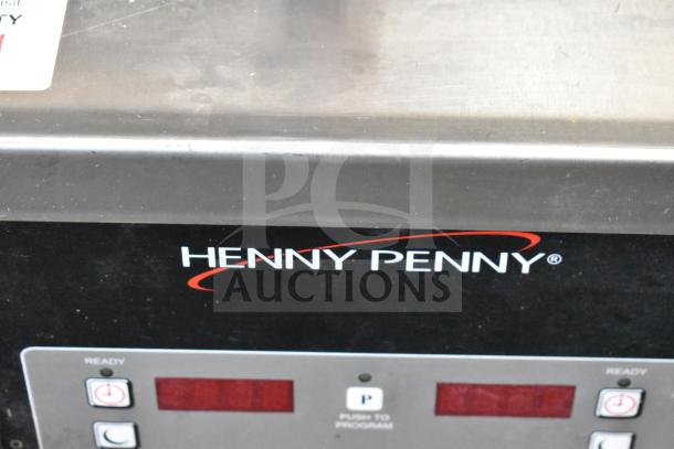 2022 Henny Penny 600 gas pressure fryer with digital controls, on commercial casters. 80,000 BTU, excellent condition.