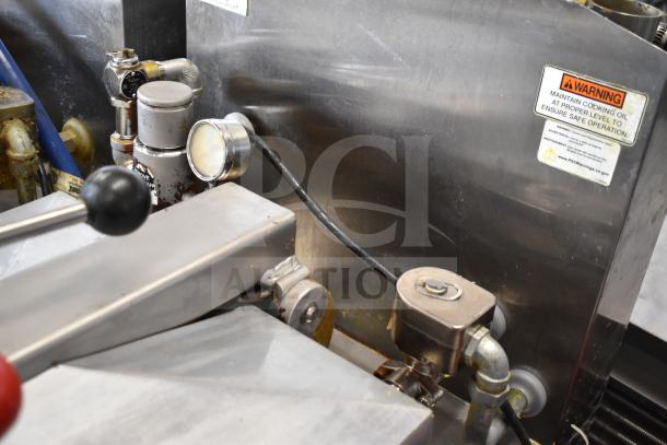 2022 Henny Penny 600 pressure fryer, natural gas, 80,000 BTU, on commercial casters. Visible safety warning label.