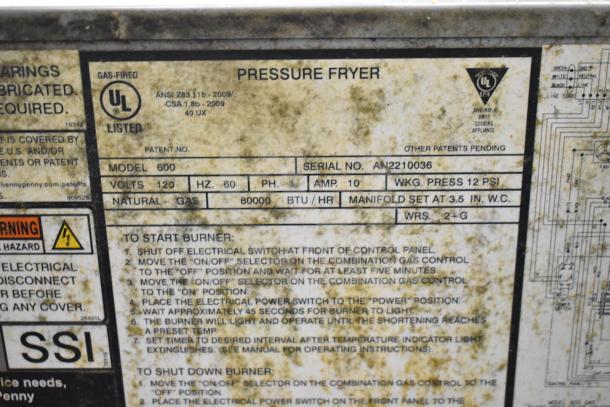 2022 Henny Penny 600 Commercial Pressure Fryer label, detailing 80,000 BTU, natural gas, 120 volts, model 600.