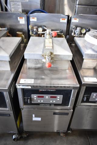 2021 Henny Penny 600 commercial gas pressure fryer, 80,000 BTU, on casters, digital controls, stainless steel, good condition.