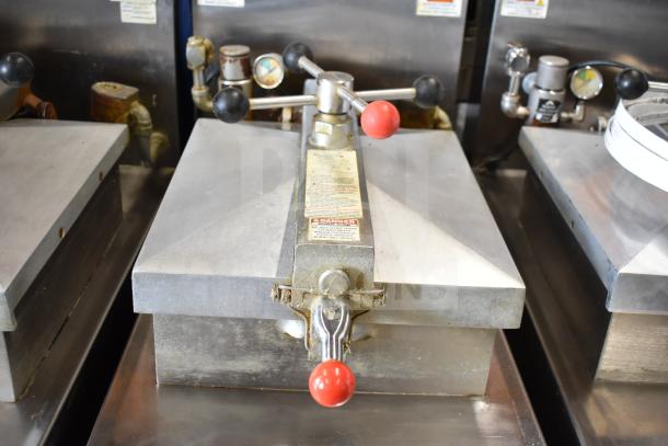 2021 Henny Penny 600 commercial pressure fryer, natural gas, 80,000 BTU, stainless steel, on casters, used condition.