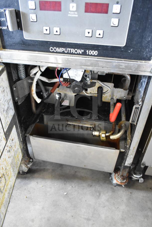 2021 Henny Penny 600 Pressure Fryer, Natural Gas, 80,000 BTU, on commercial casters, features Computron 1000 control.