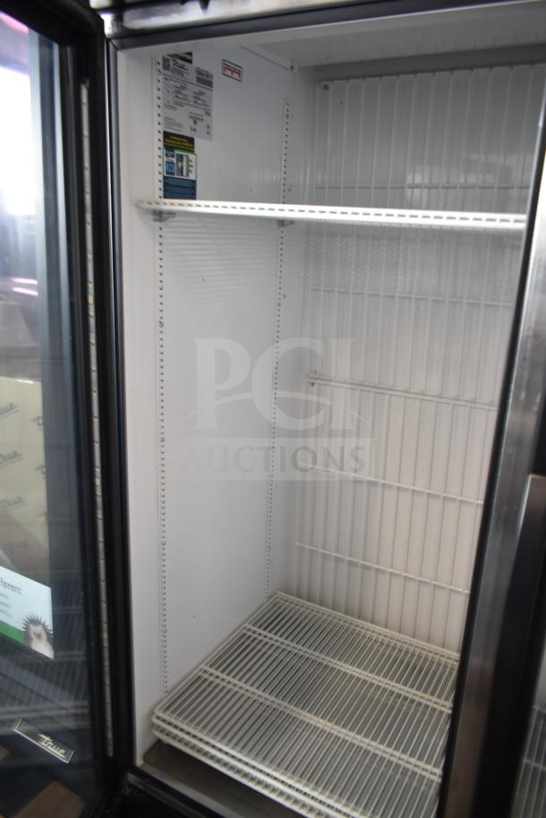 2020 True GDM-49F-HC 2 Door Freezer Merchandiser, clean interior, 115/208-230V, 1 Phase, visible specs label.