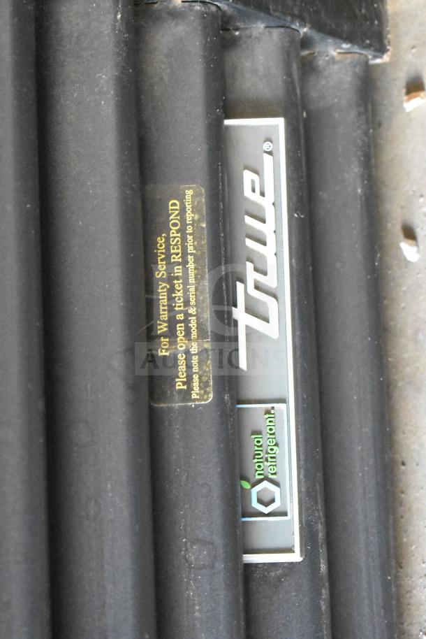 2018 True GDM-72-HC cooler label showing brand and natural refrigerant marking.