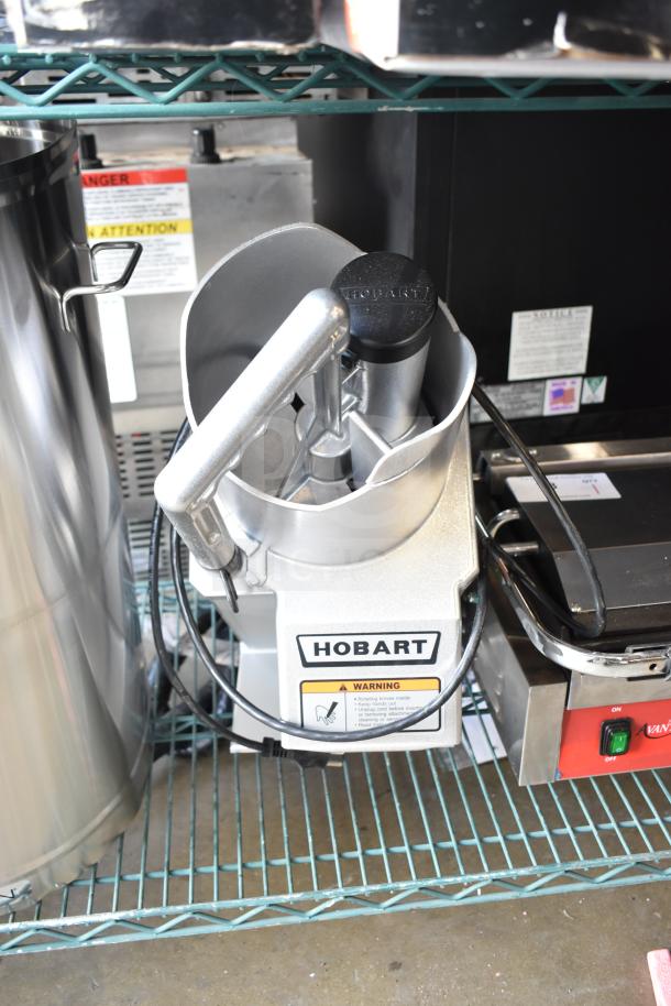Brand new 2022 Hobart FP150-1 food processor, full moon pusher, continuous feed, 110-120V, 1 phase, slight scratch and dent condition.