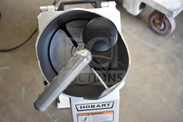 Brand new Hobart FP150-1 food processor with scratches. Continuous feed, 110-120V, 1 phase. Hobart logo visible.