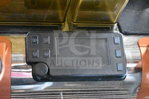 2019 Thermoplan Mastrena M2-CS espresso machine control panel, black buttons, touchscreen, minor wear visible.