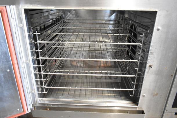 2 Groen CC20-G stainless steel commercial convection ovens, 90,000 BTU, natural gas powered, interior view with racks.