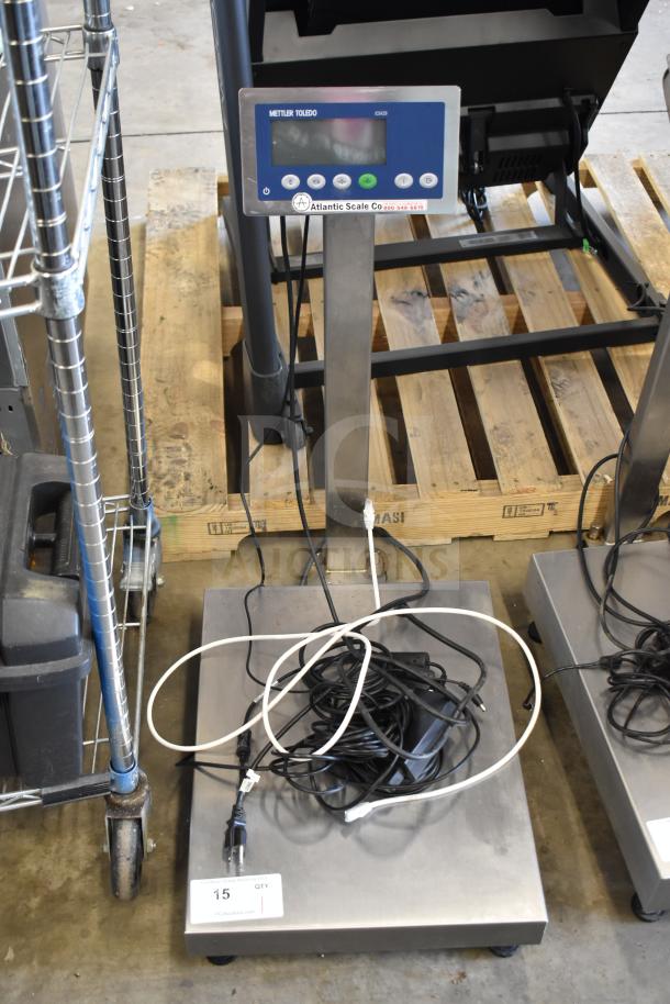 Mettler Toledo ICS4x9-1 commercial bench scale, 100-240V, 1 Phase, with display panel and cords on stainless steel platform.