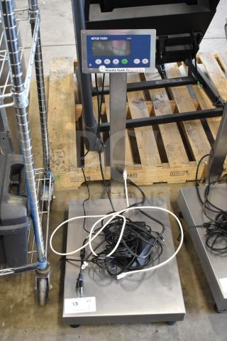 Mettler Toledo ICS4x9-1 commercial bench scale, 100-240V, 1 Phase, with display panel and cords on stainless steel platform.