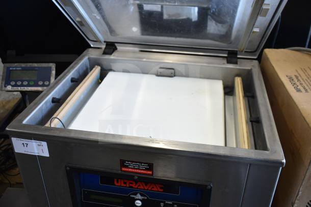 Koch Ultravac UV500 vacuum sealing machine on casters, 240V, 3-phase. Features control panel and open lid.