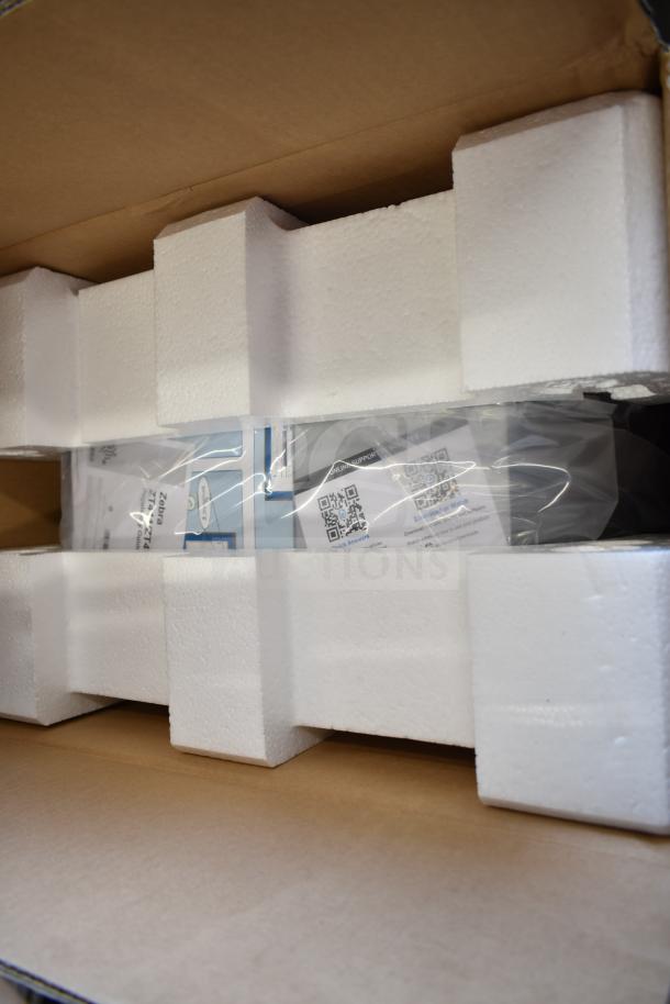 Brand new Zebra ZT41146-T010000Z barcode scanner in original packaging with protective foam inserts.