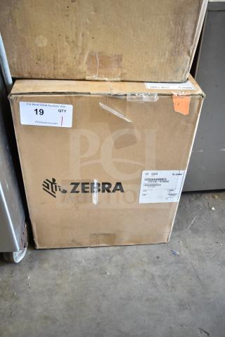 Brand new Zebra ZT41146-T010000Z barcode scanner in original box. Scratch and dent condition label visible.