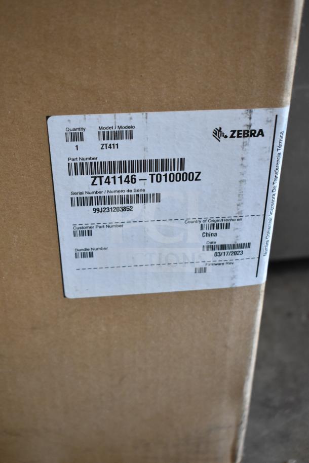 BRAND NEW Scratch and Dent Zebra ZT41146-T010000Z Barcode Scanner, model ZT411, in original packaging with visible label.