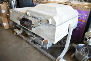 2016 UltraSource Ultravac UY 2100 vacuum sealing machine on casters, 230V, 3 phase, commercial use, visible control panel.