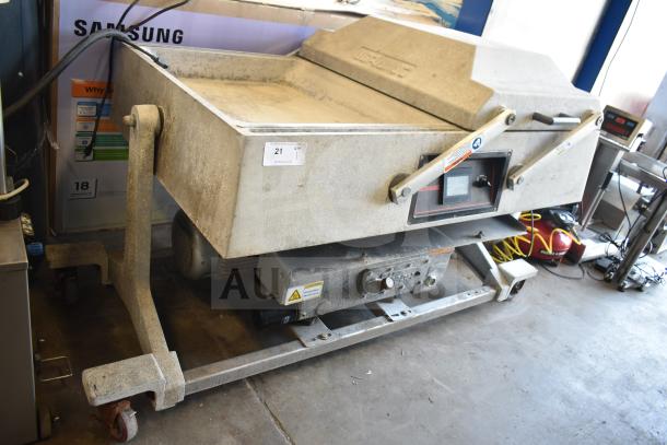 2016 UltraSource Ultravac UY 2100 vacuum sealing machine on casters, 230V, 3 phase, in used condition. Visible control panel and levers.