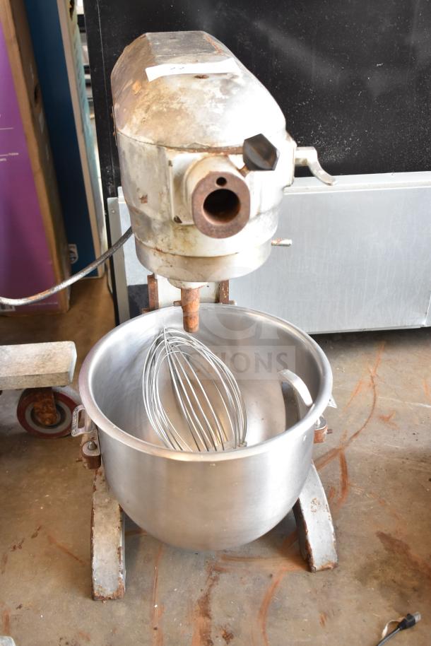 Hobart A-200 commercial 20-quart dough mixer with bowl, whisk, and dough hook. 115 volts, 1 phase, visible wear.