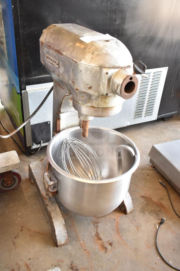 Hobart A-200 20 Qt commercial mixer with bowl, dough hook, and whisk. Used condition; visible wear. 115V, 1 Phase.