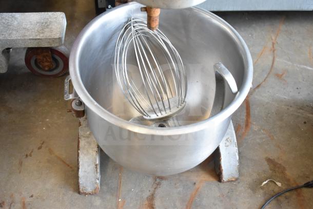 Hobart A-200 commercial mixer with 20-quart bowl, dough hook, and whisk. 115 volts, 1 phase, in used condition.