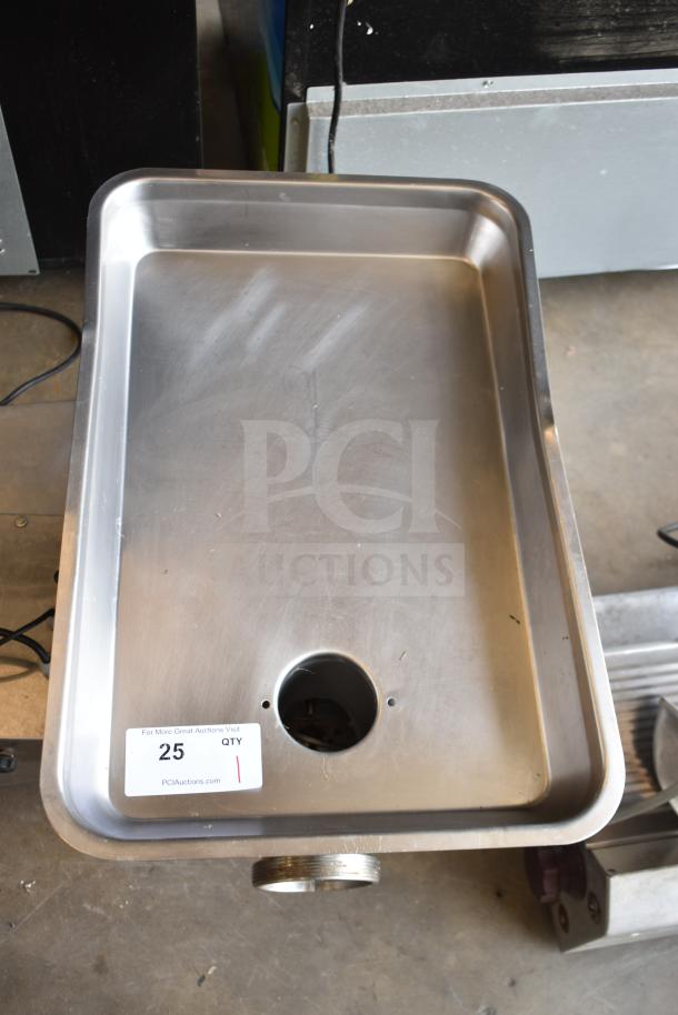 Minerva Omega A/32 commercial meat grinder, stainless steel, 220 volts, 1 phase, visible auction tag.