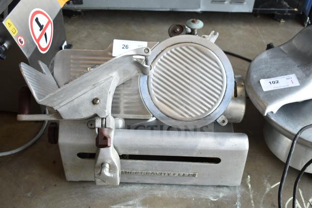 Globe 685 commercial countertop meat slicer with blade sharpener, 115 volts, 1 phase, visible wear, features model label.