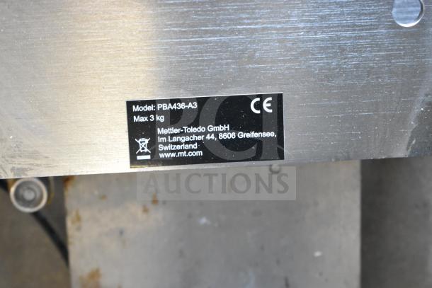 Mettler Toledo PBA436-A3 commercial scale, max 3kg, stainless steel, used condition. Model and CE markings visible.
