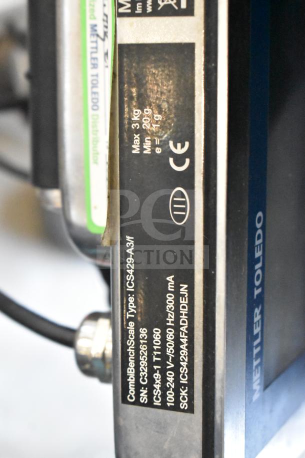 Mettler Toledo PBA436-A3 commercial scale with model and serial numbers displayed. Max load 3 kg; min load 20 g.
