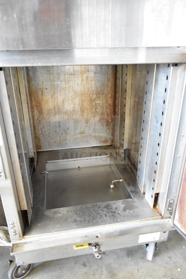 Winston CVap CA8522GR Cook N Hold Oven on casters, stainless steel, 208V, 1-phase, interior shows wear.