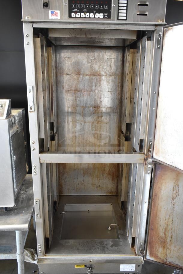 Winston CVap CA8522GR commercial oven, stainless steel interior, visible wear, on casters, 208V, 1 phase, USA made.