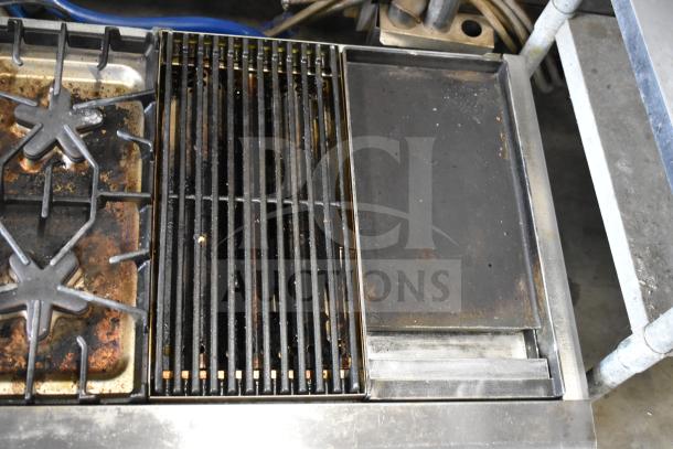 Thermador Commercial 4 Burner Gas Range with Charbroiler and Griddle, in used condition, showcasing surface wear.