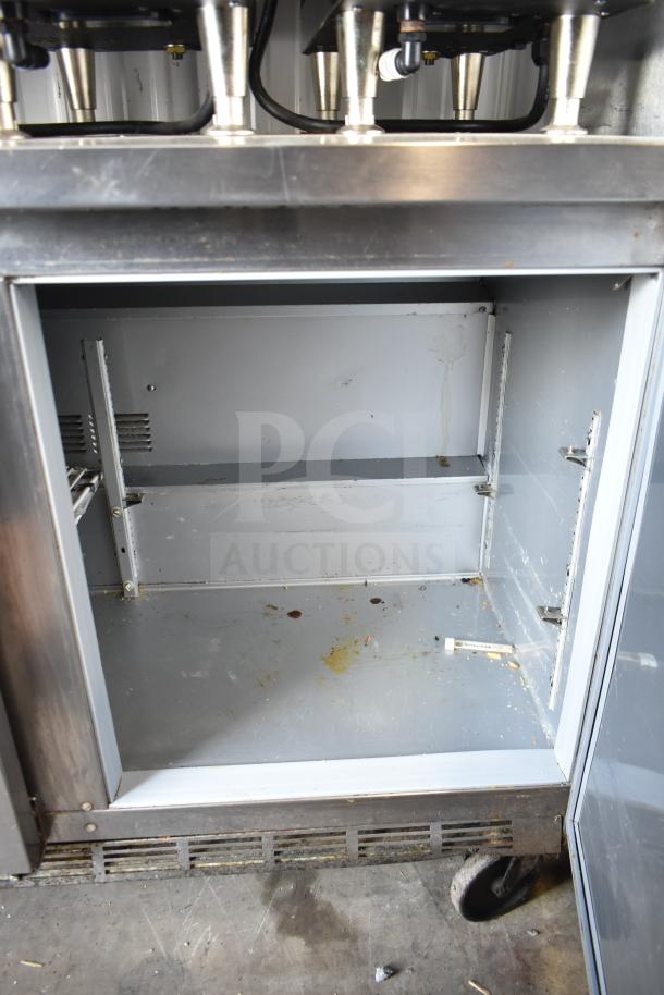 Beverage Air WTR72AY 3-door undercounter cooler, stainless steel. Visible interior wear, 115 volts, 1 phase.