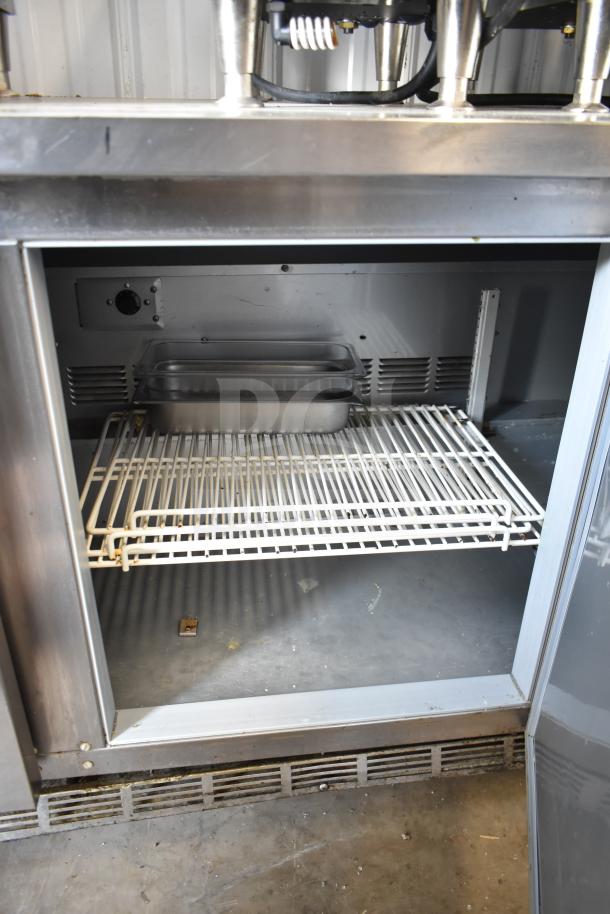 Beverage Air WTR72AY 3-Door Undercounter Cooler, interior view, 115V, 1 phase, stainless steel with visible shelving.