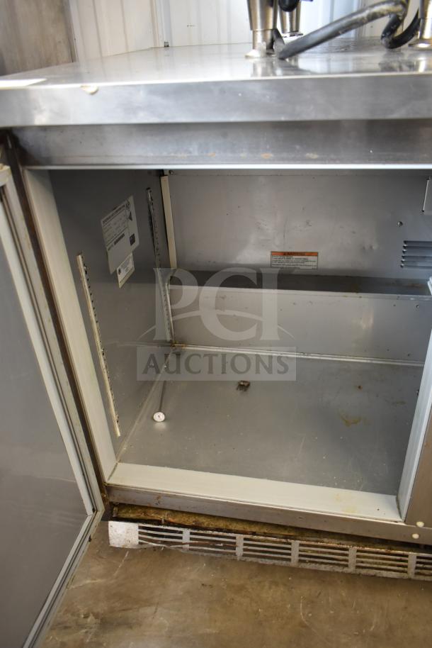 Beverage Air WTR72AY commercial undercounter cooler, 3-door, 115V, stainless steel, interior view showing shelving slots.