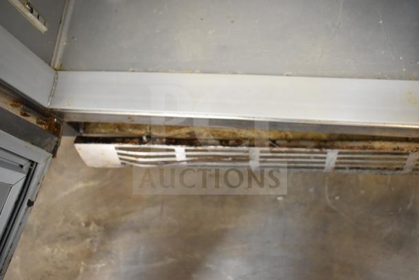 Beverage Air WTR72AY undercounter cooler, 3 doors. Visible wear and rust near vent. 115V, 1 Phase. Commercial use.