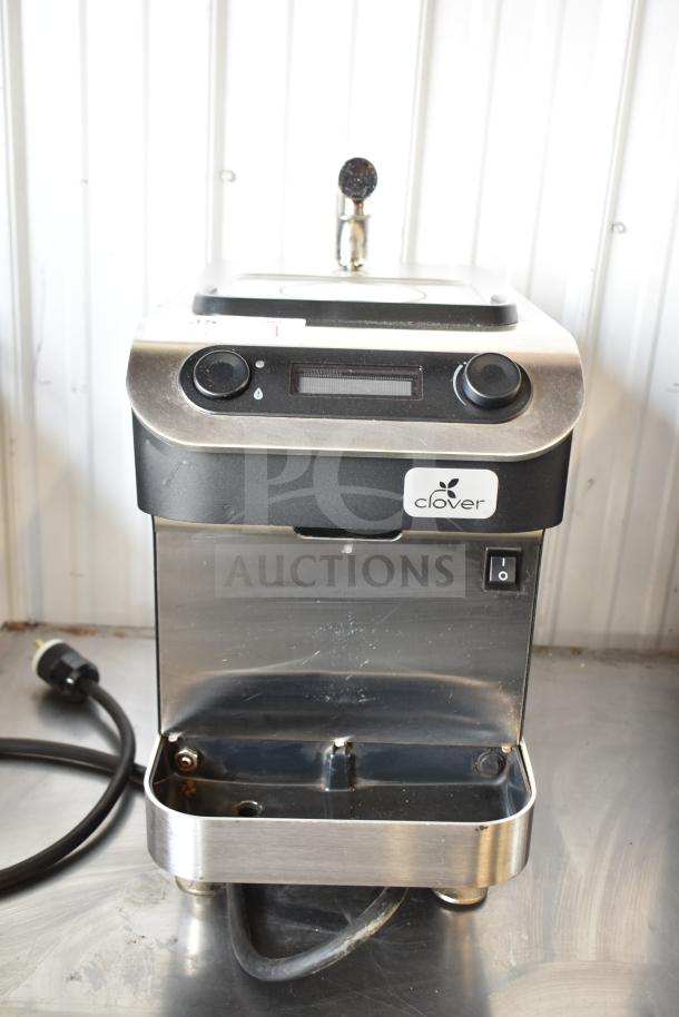 Clover 1S countertop single-cup coffee brewer, stainless steel, visible power cord, branded logo, good condition.