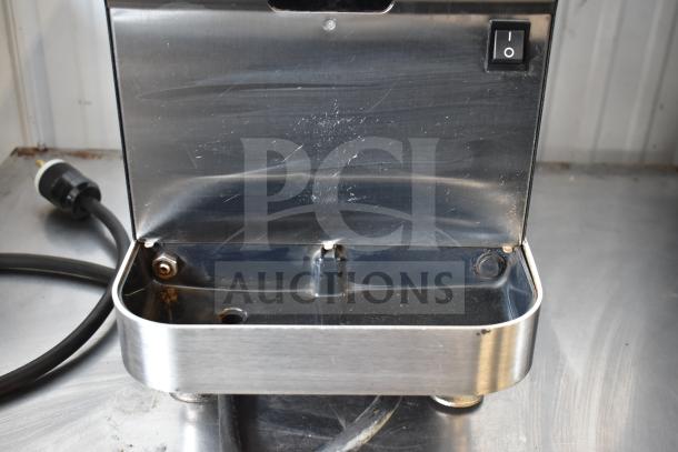 Clover 1S countertop single-cup coffee brewer, stainless steel, 200-240 volts, 1 phase. Slight wear visible on surface.