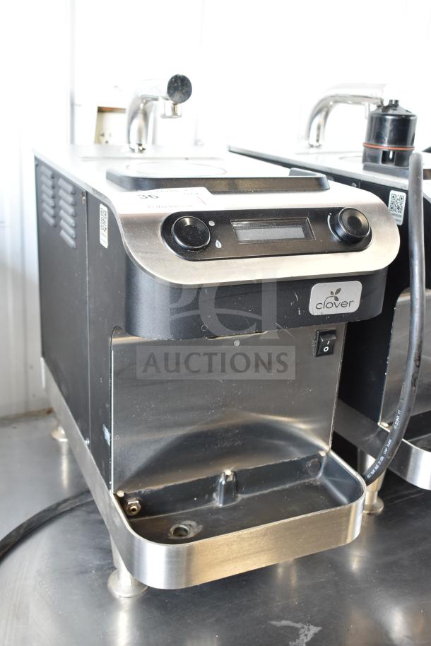 Clover 1S Countertop Premium Automated Single-Cup Coffee Brewer, black and silver, with display and control knobs. Model 1S.