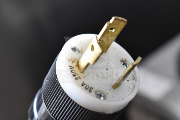 Clover 1S premium coffee brewer plug; 200-240 volts, 1 phase, 30A; visible wear indicating use.