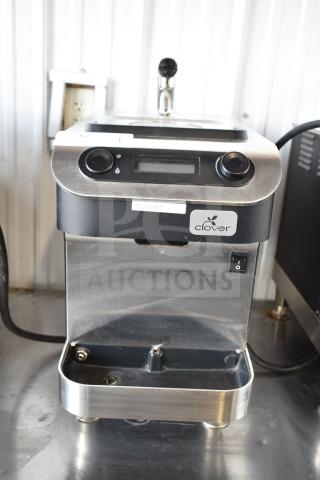 Clover 1S countertop single-cup coffee brewer, stainless steel, automated, 200-240 volts, visible logo and controls.