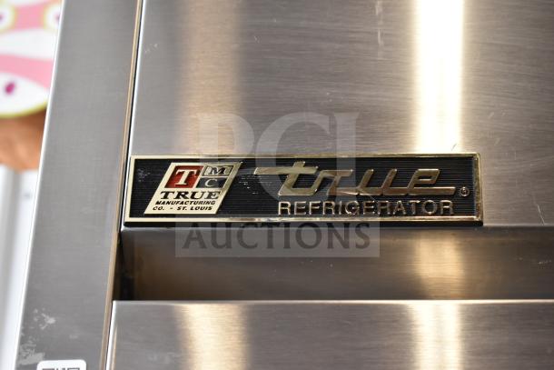 True TG1R-1S Reach In Cooler, stainless steel, commercial casters, label shows brand and origin. 115V, 1 phase.