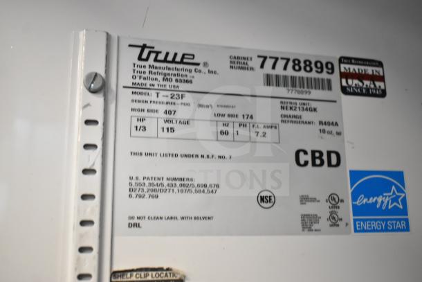 True T-23F commercial freezer label, showing model, 115V power, refrigerant type, and Energy Star certification.