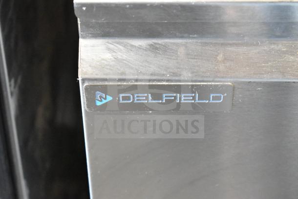 2020 Delfield D4460NP-24M-A5 commercial prep table, stainless steel, 4 drawers, Delfield logo, on casters, 115V, 1 Phase.