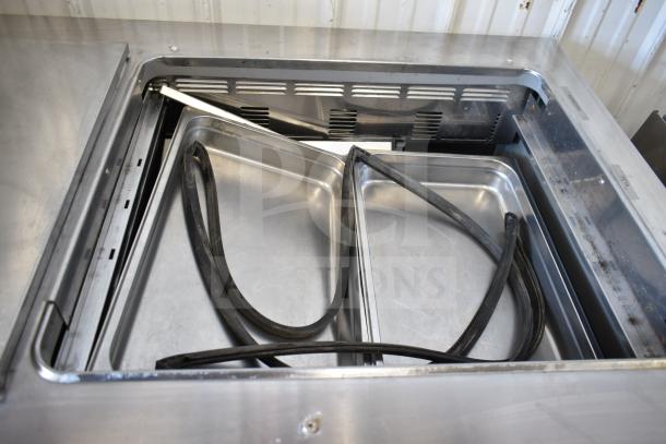 2020 Delfield D4460NP-24M-A5 commercial prep table, stainless steel, 4 drawers, commercial casters, 115V, 1 Phase.