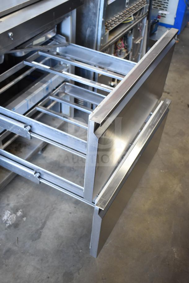 2020 Delfield D4460NP-24M-A5 commercial prep table with 4 stainless steel drawers, on casters. 115V, 1 Phase.