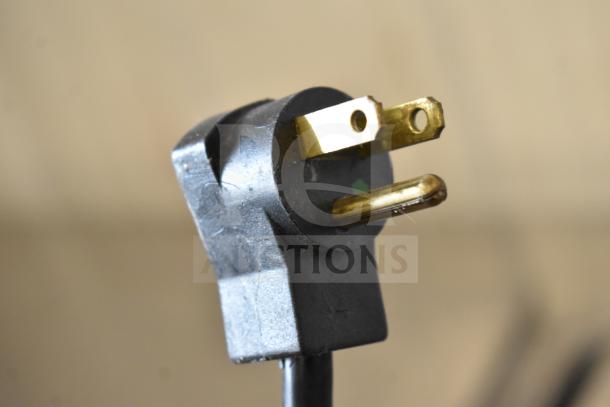 Close-up of a power plug for the 2020 Delfield D4460NP-24M-A5 commercial prep table.