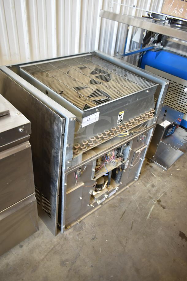Ice-O-Matic ICE1506HT1 Slimline Ice Machine, 30", half dice cubes, top air discharge, 1430 lb capacity, used condition.